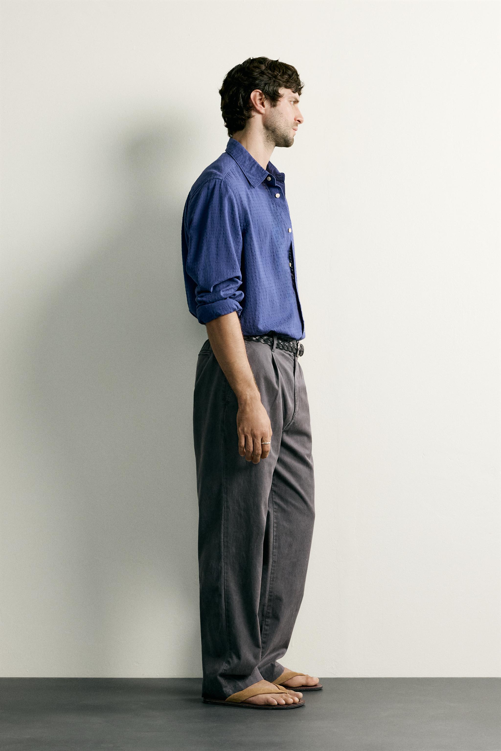 RELAXED FIT PLEATED CHINO PANTS